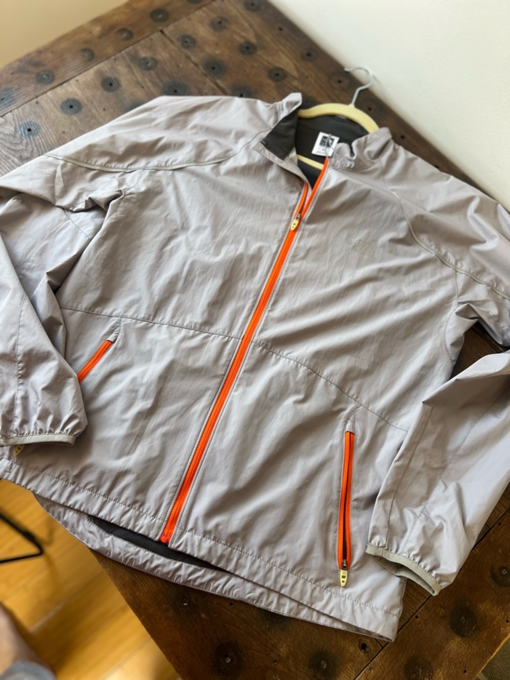The North Face - Silver Men's Windbreaker Running Jacket with Orange Zipper